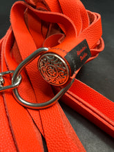 Load image into Gallery viewer, Finger Flogger: Orange Leather with Decorative Concho