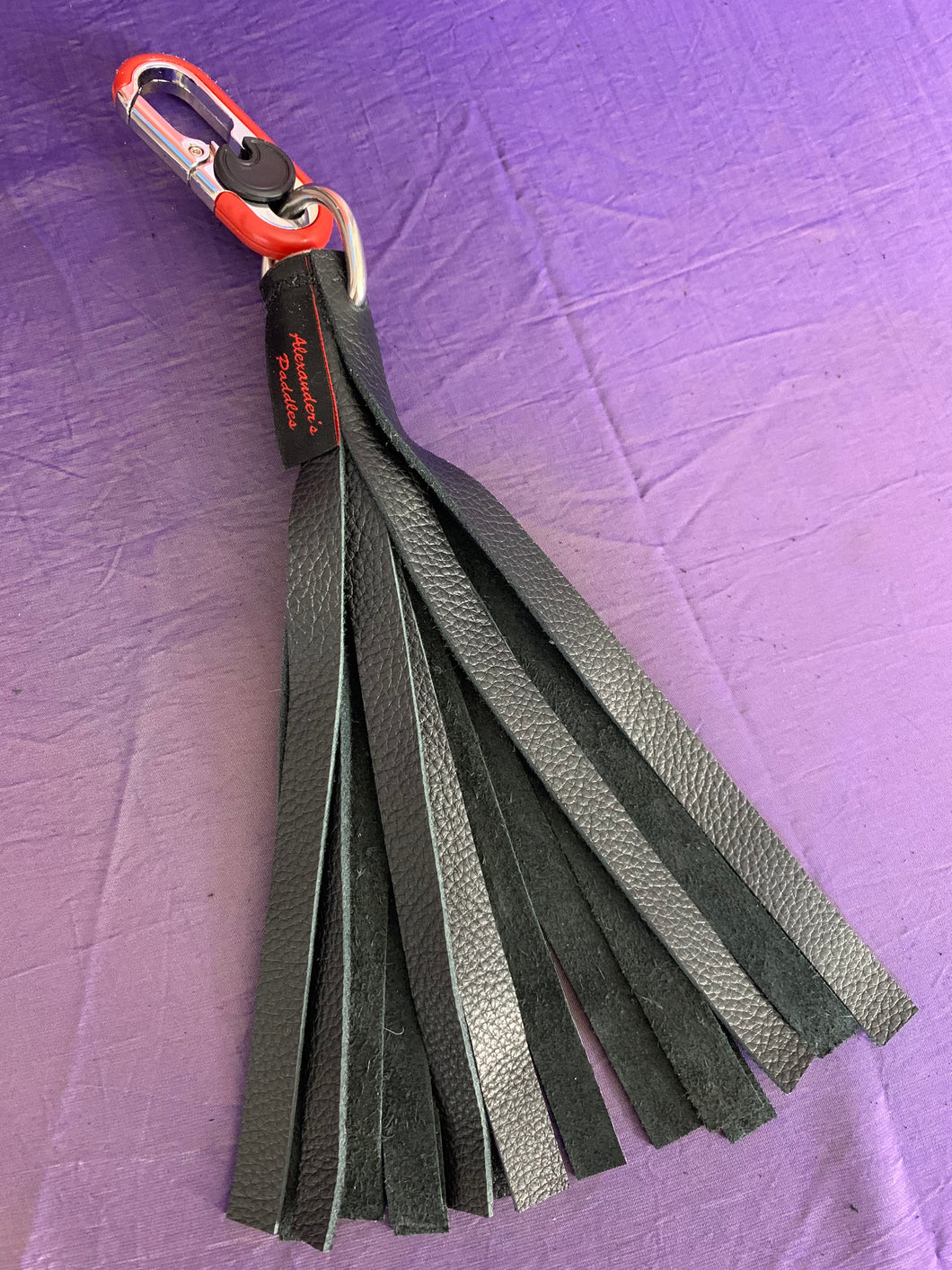 Flogger: Black Leather Keychain Flogger with Red Metal Fob