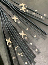 Load image into Gallery viewer, Flogger: The Scourge black leather flogger with metal embellishments
