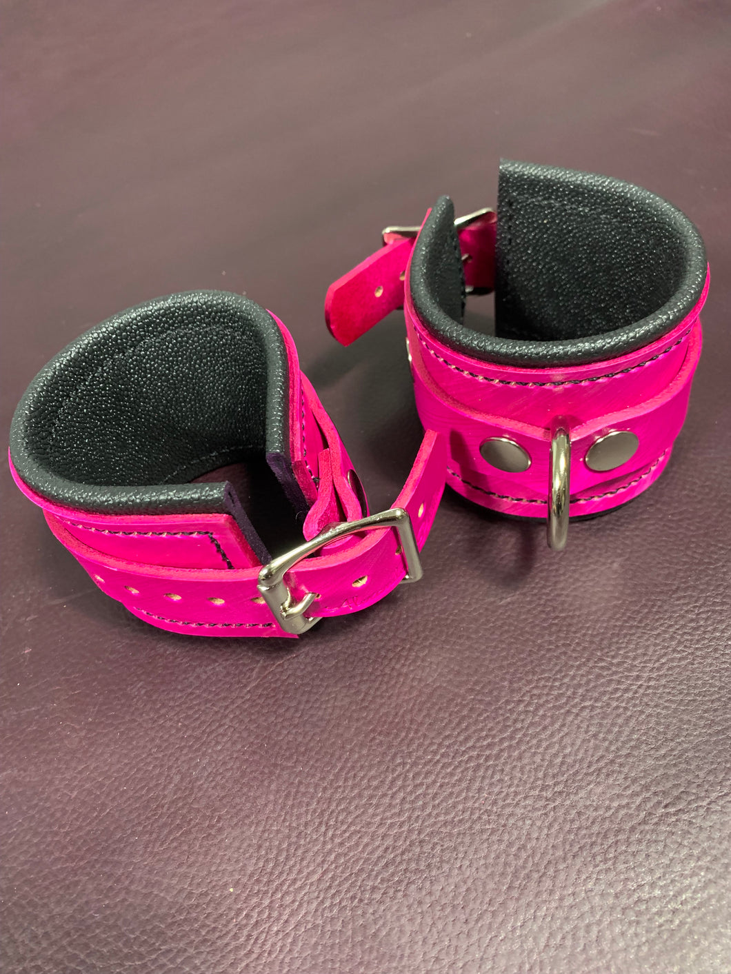 Cuffs: Wrist Cuffs in Pink and Black Leather, One Pair