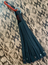 Load image into Gallery viewer, Flogger: black leather riveted key chain flogger with red metal fob
