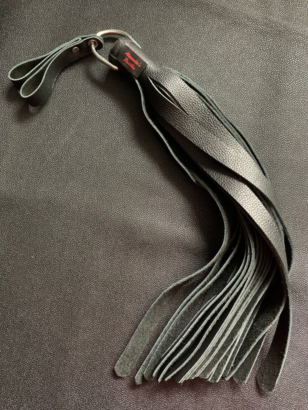 Finger Flogger: Full Size, Black Leather with Flower Conch